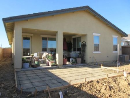 Enlarged 12×19? patio and another pad for a shed was in the design Betty built.
